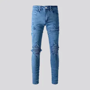 Distressed mid rise men's jeans