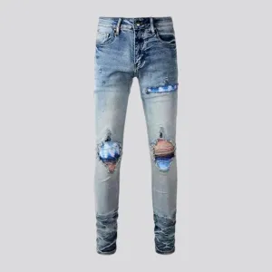 Distressed vintage mid-rise riding men's jeans