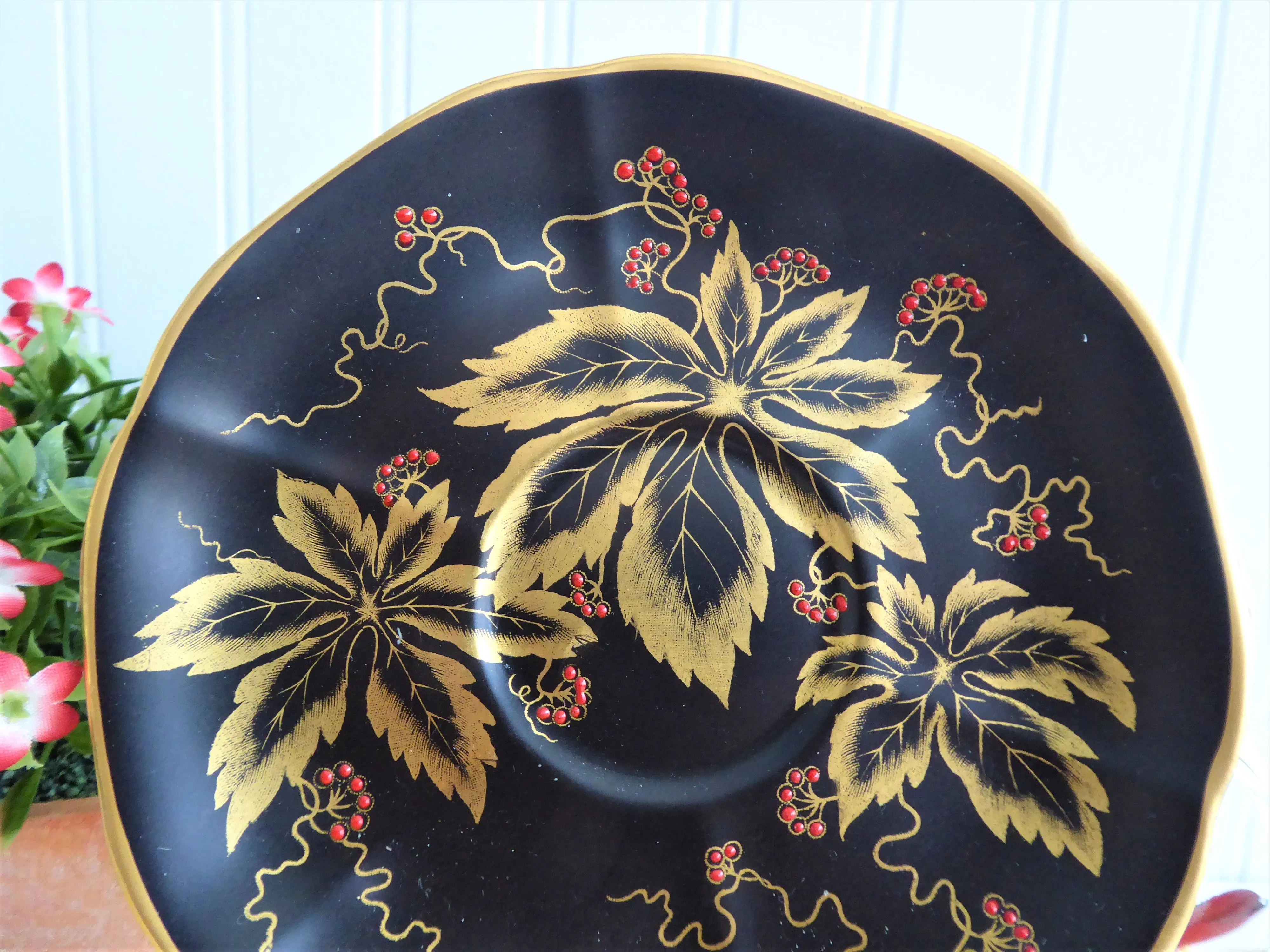 Elegant Black Cup And Saucer Metallic Gold Leaves Red Enamel Tuscan 1940s