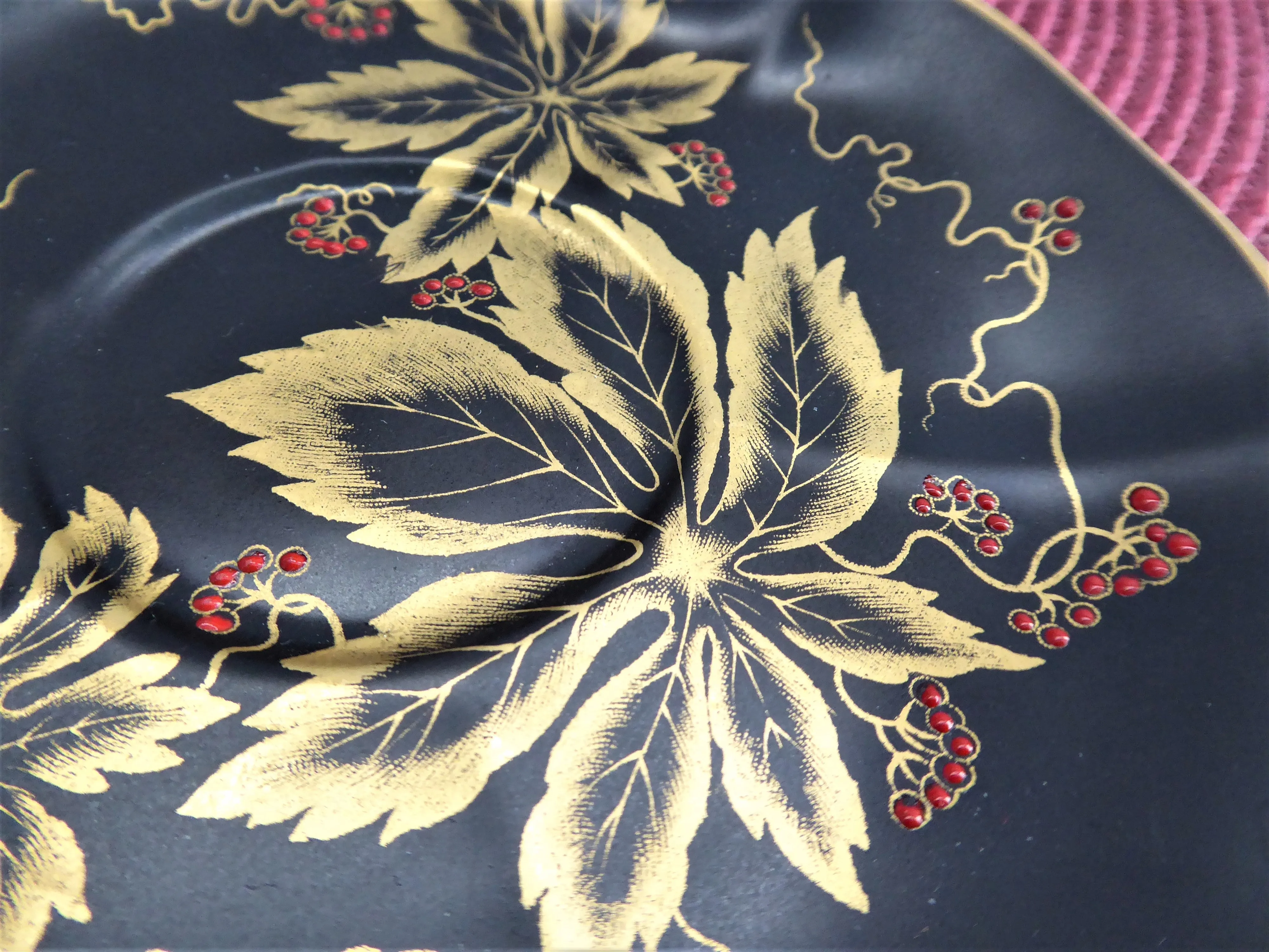 Elegant Black Cup And Saucer Metallic Gold Leaves Red Enamel Tuscan 1940s