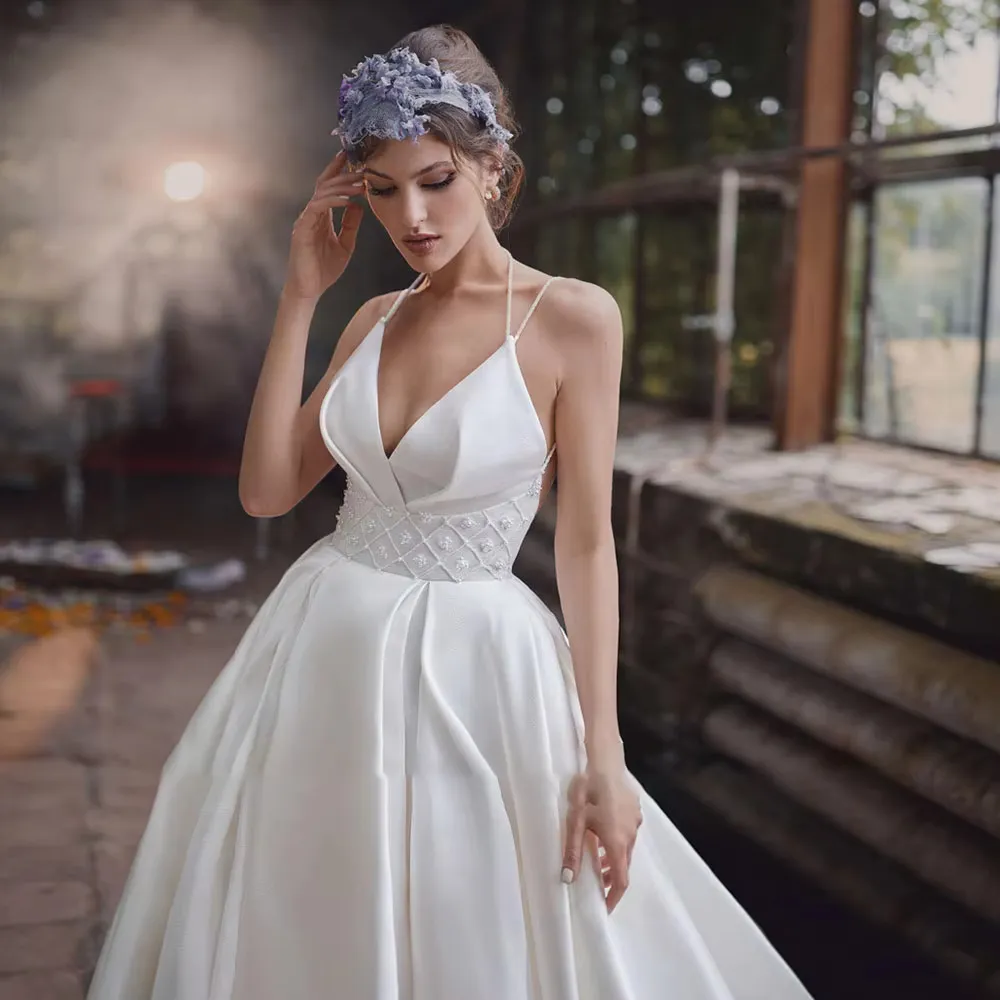 Elegant V-Neck Satin Wedding Dress with Slit Skirt and Pearl Beading for Modern Brides