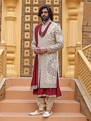 Elite Cream & Red Mens Sherwani In Silk With Traditional Peacock Motif