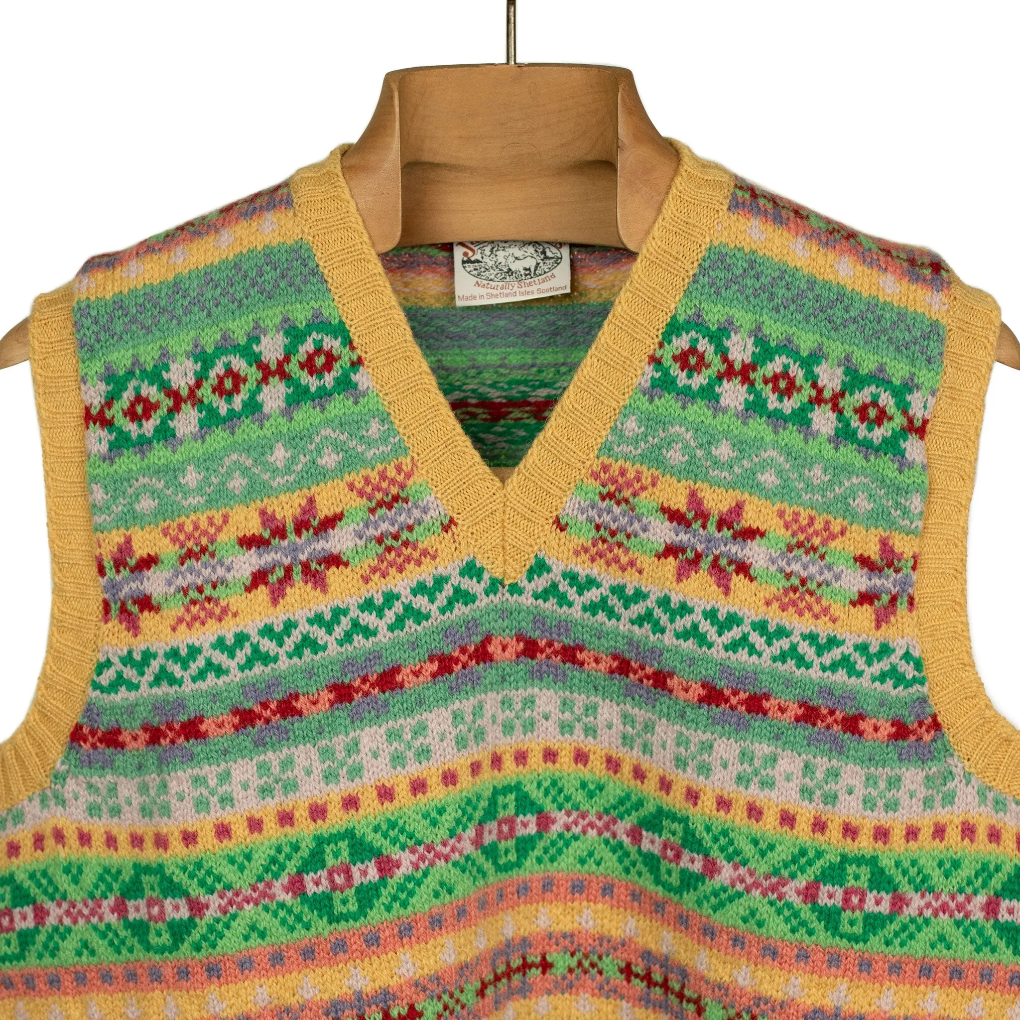 Fair Isle v-neck sweater vest, mango, cherry red, mint green, and pink (restock)