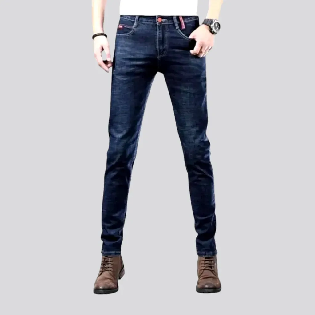 Fitted mid rise elastic men's jeans