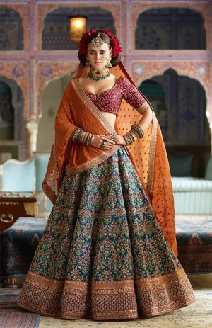 Flamboyant Blue-Red Colored Bridal wear Embroidered Lehenga Choli