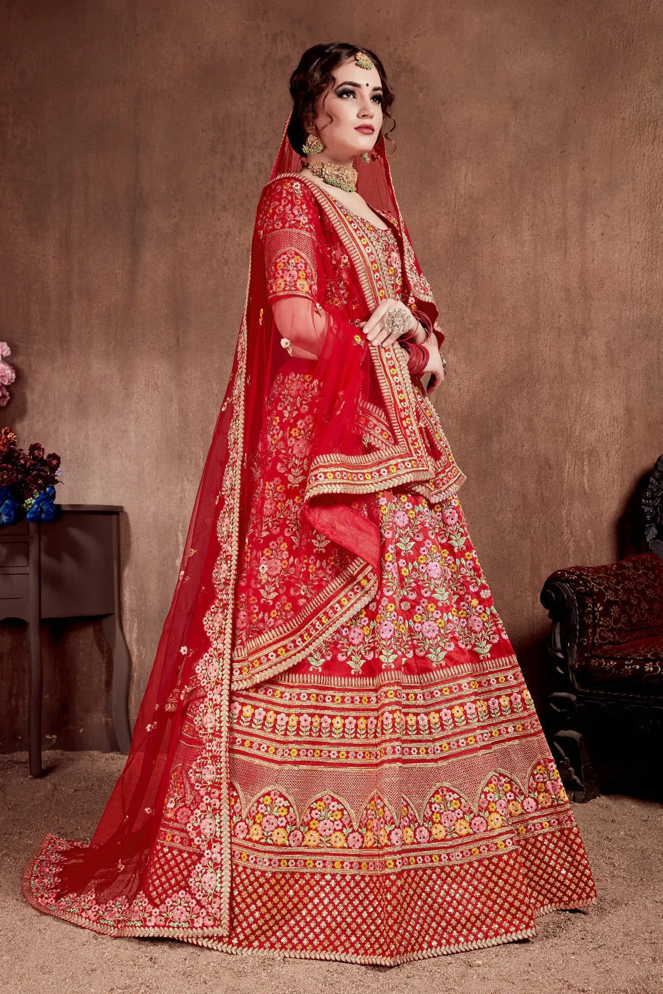 Flattering Red Colored Designer Bridal wear Embroidered Lehenga Choli