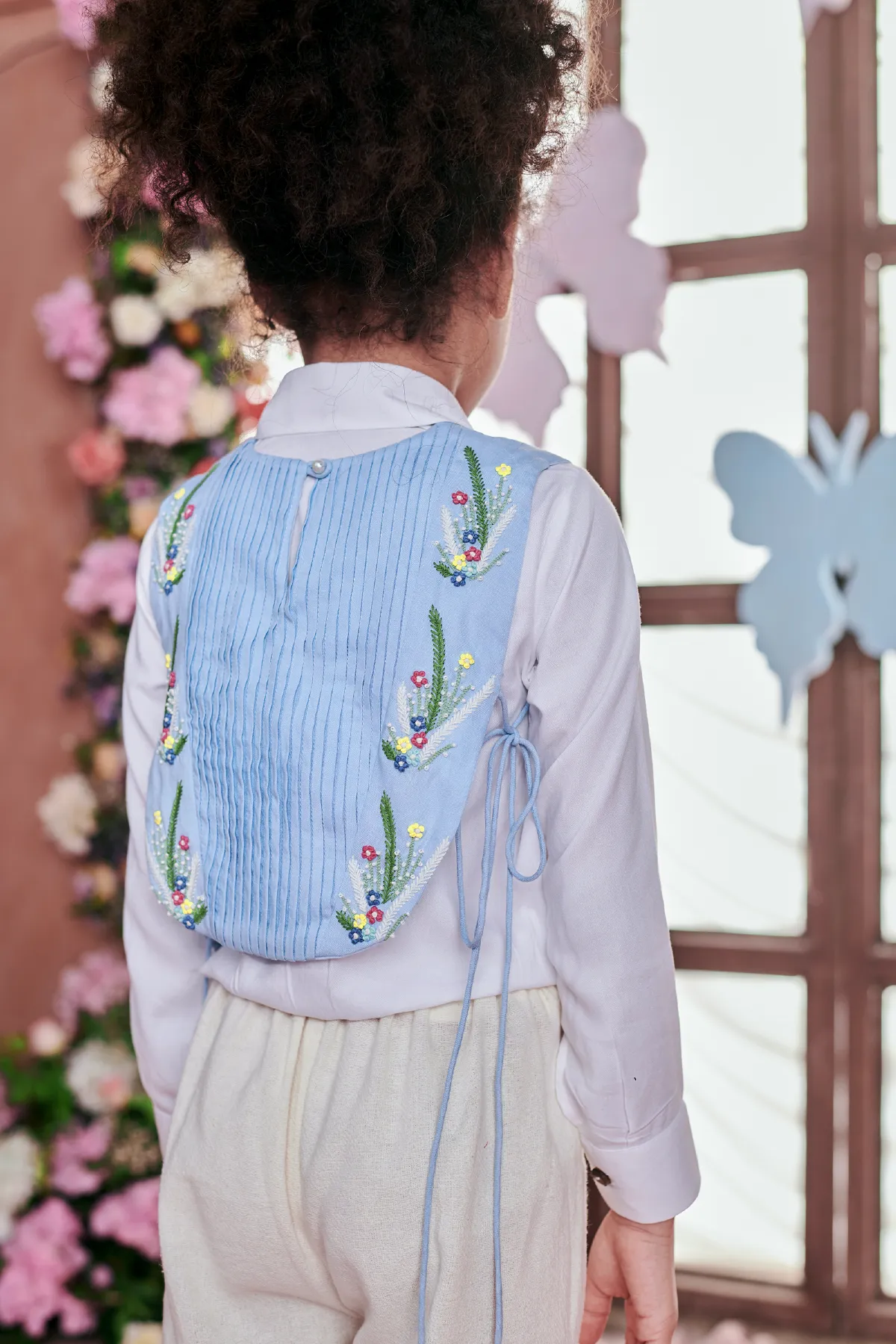 Gaia- Thread Embroidered Bib With Pin Tucks Detailing