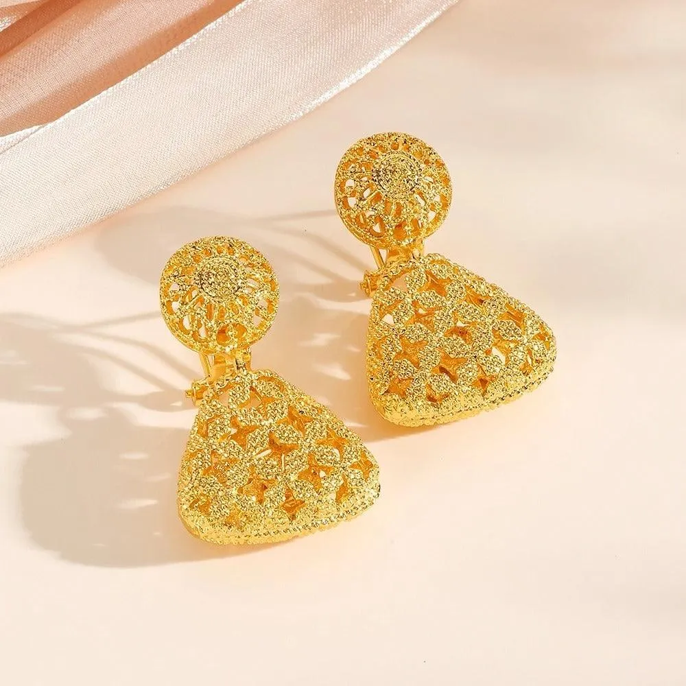 Golden Tribal Earrings with Intricate Geometric Patterns