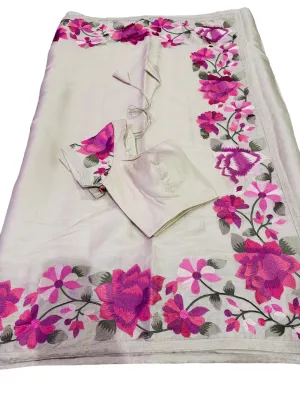 GRACEFUL IVORY DOLA SILK TUSAR SAREE WITH VIBRANT FLORAL EMBROIDERY