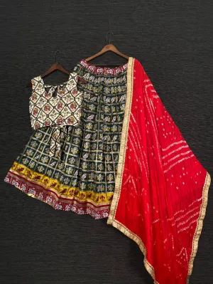 Green Color Jacquard Patola Chaniya Choli With Red Bandhej Silk Dupatta