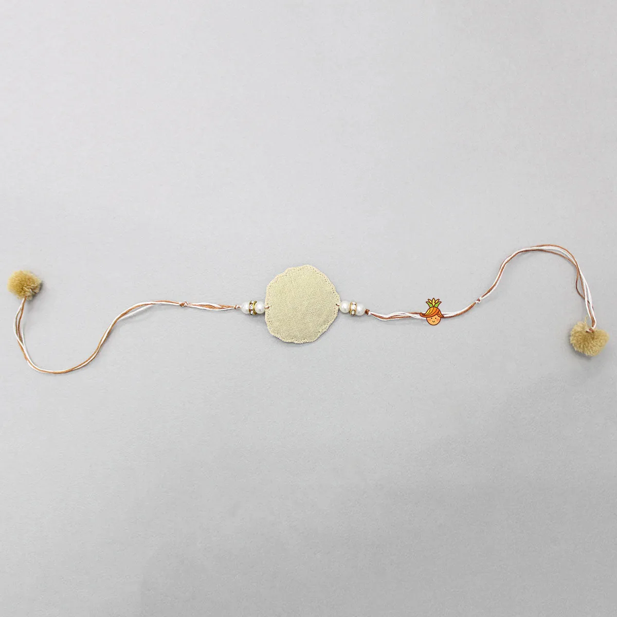 Hand Embroidered Rakhi With Flower Design