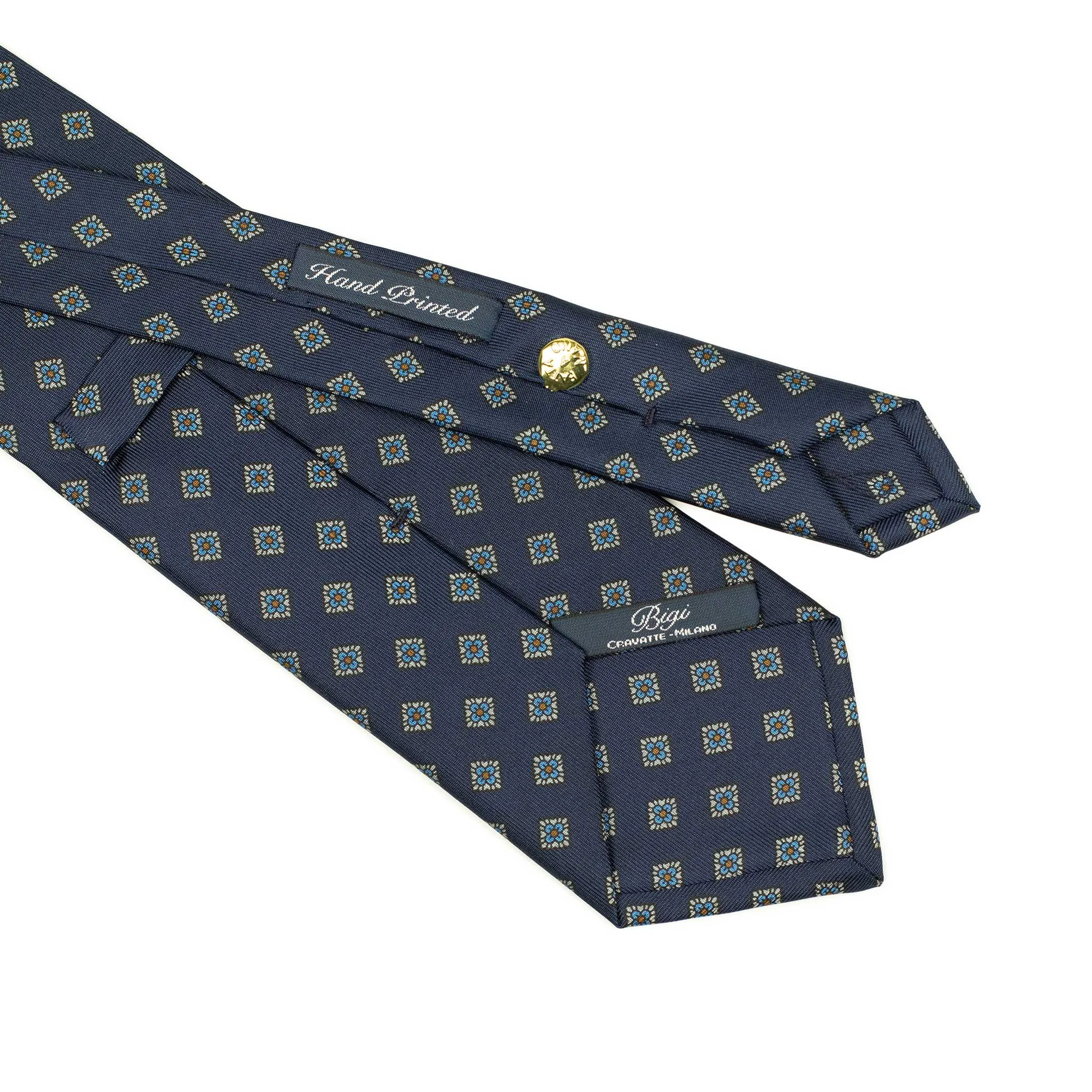 Hand-printed navy silk twill tie, blue and orange medallion print