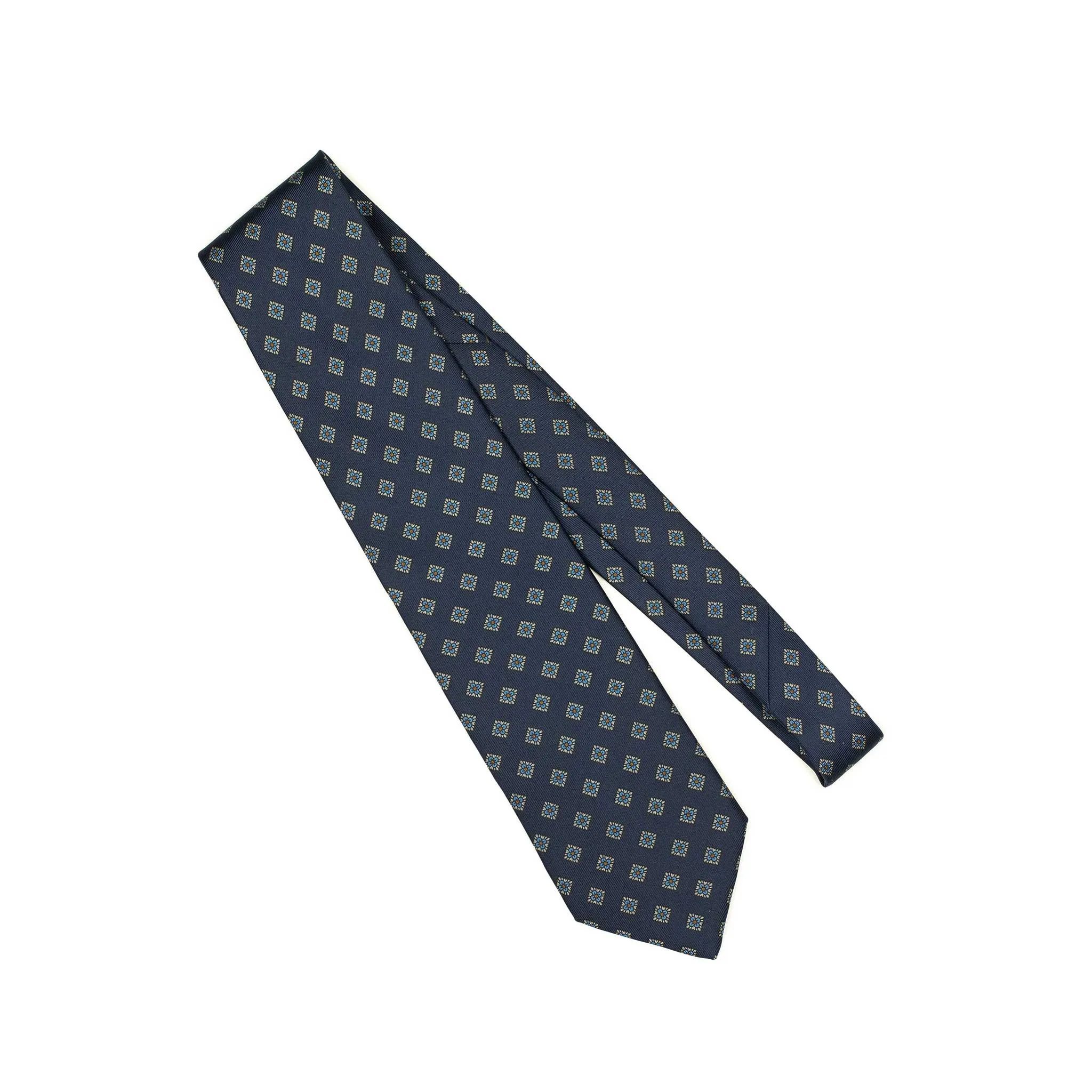 Hand-printed navy silk twill tie, blue and orange medallion print