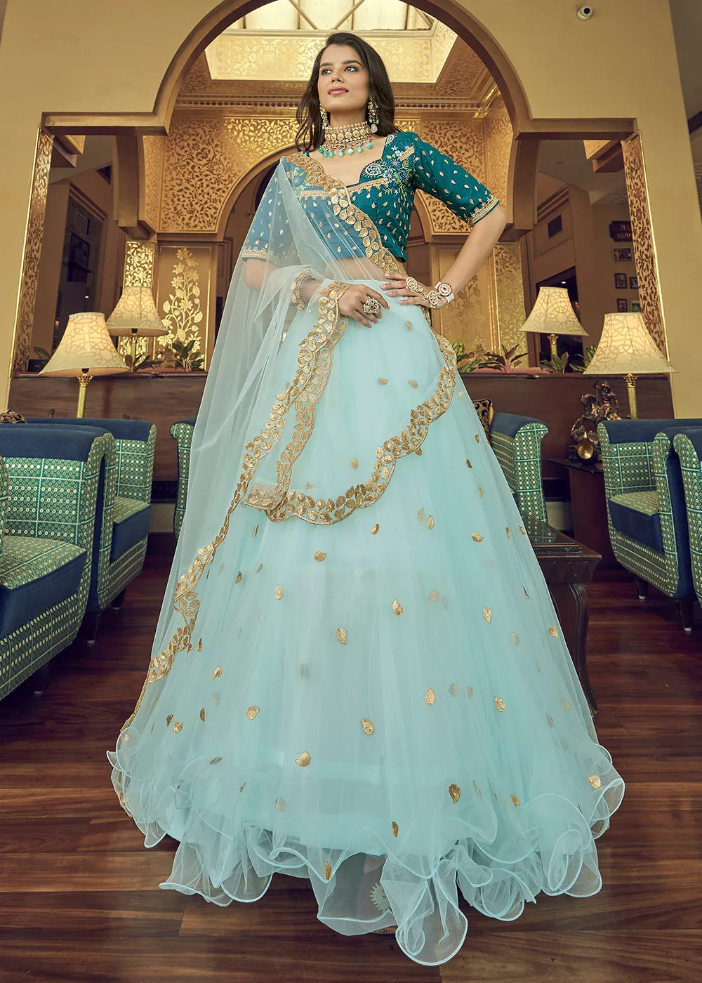 Impressive Sky Blue Heavy Net Party Wear Lehenga Choli