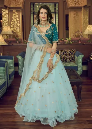 Impressive Sky Blue Heavy Net Party Wear Lehenga Choli