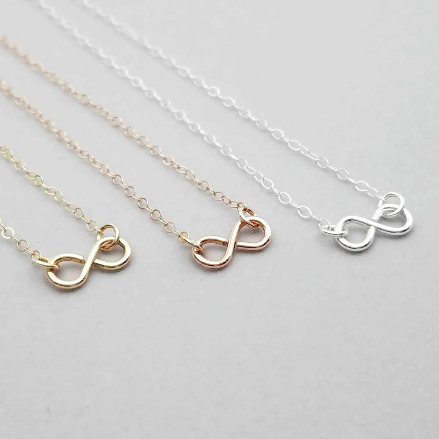 Infinity Necklace in Sterling Rose and Yellow Gold