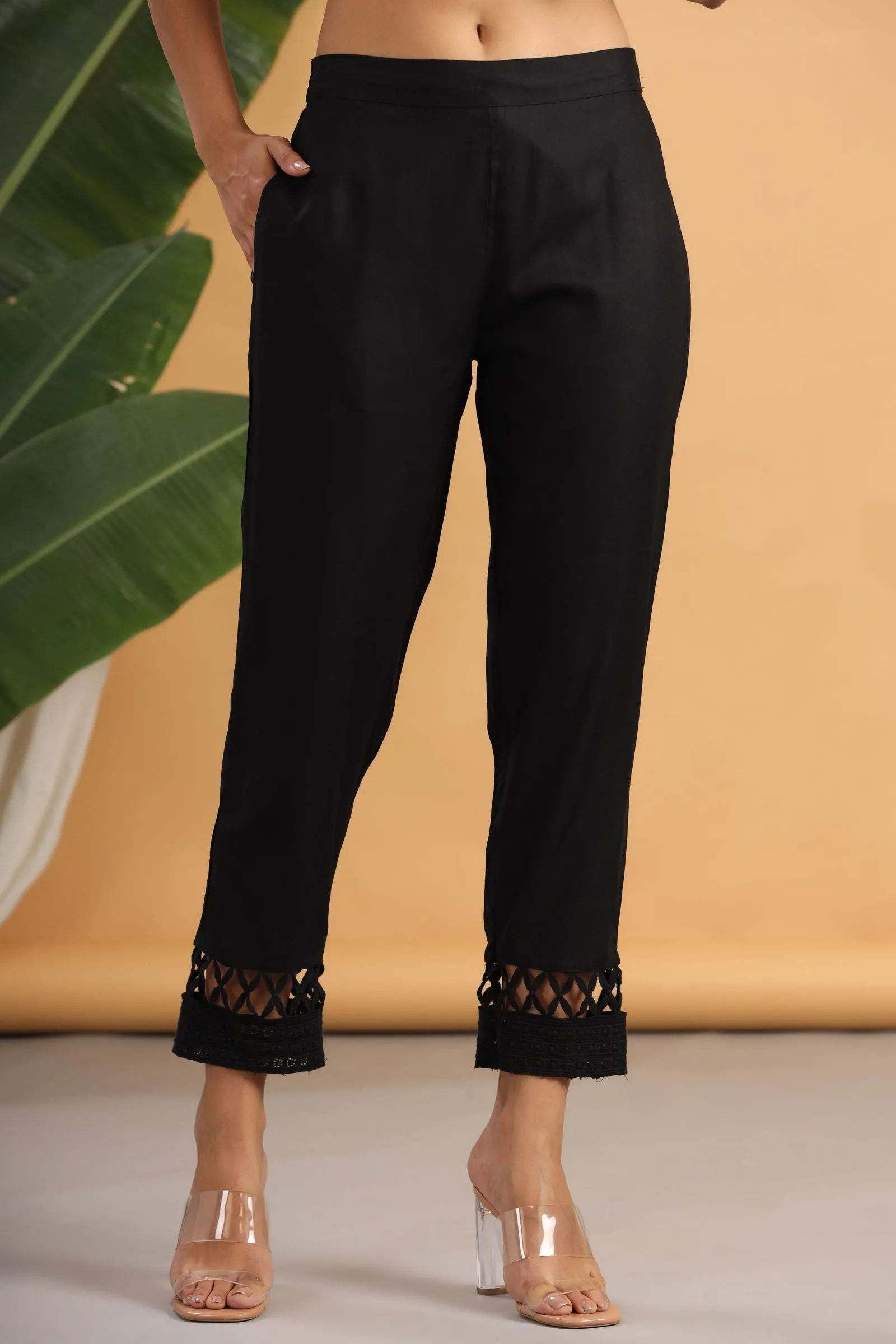 Jashvi Black Solid Rayon Ankle-Length Slim Fit Pants.