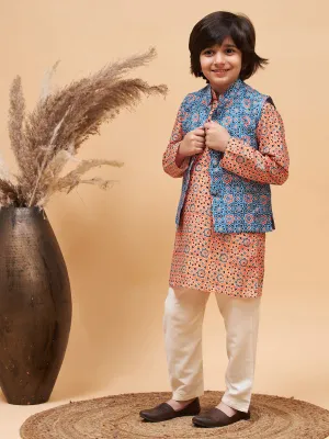 Jashvi Boy's Orange Printed Kurta And Cream Pyjama Set With Blue Nehru Jacket