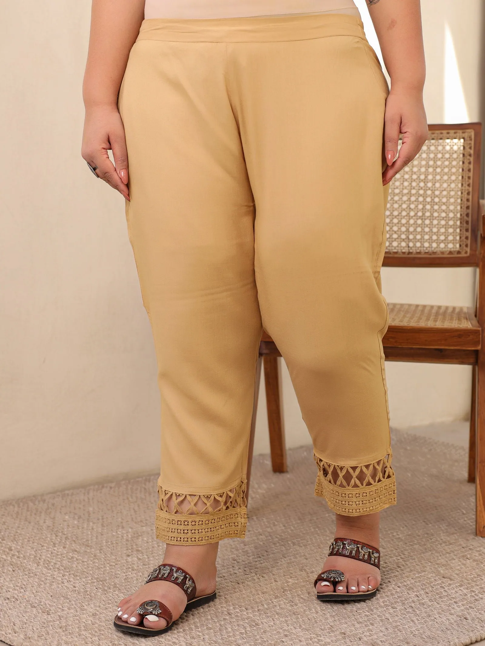 Jashvi Gold Solid Rayon Ankle-Length Slim Fit Pants.