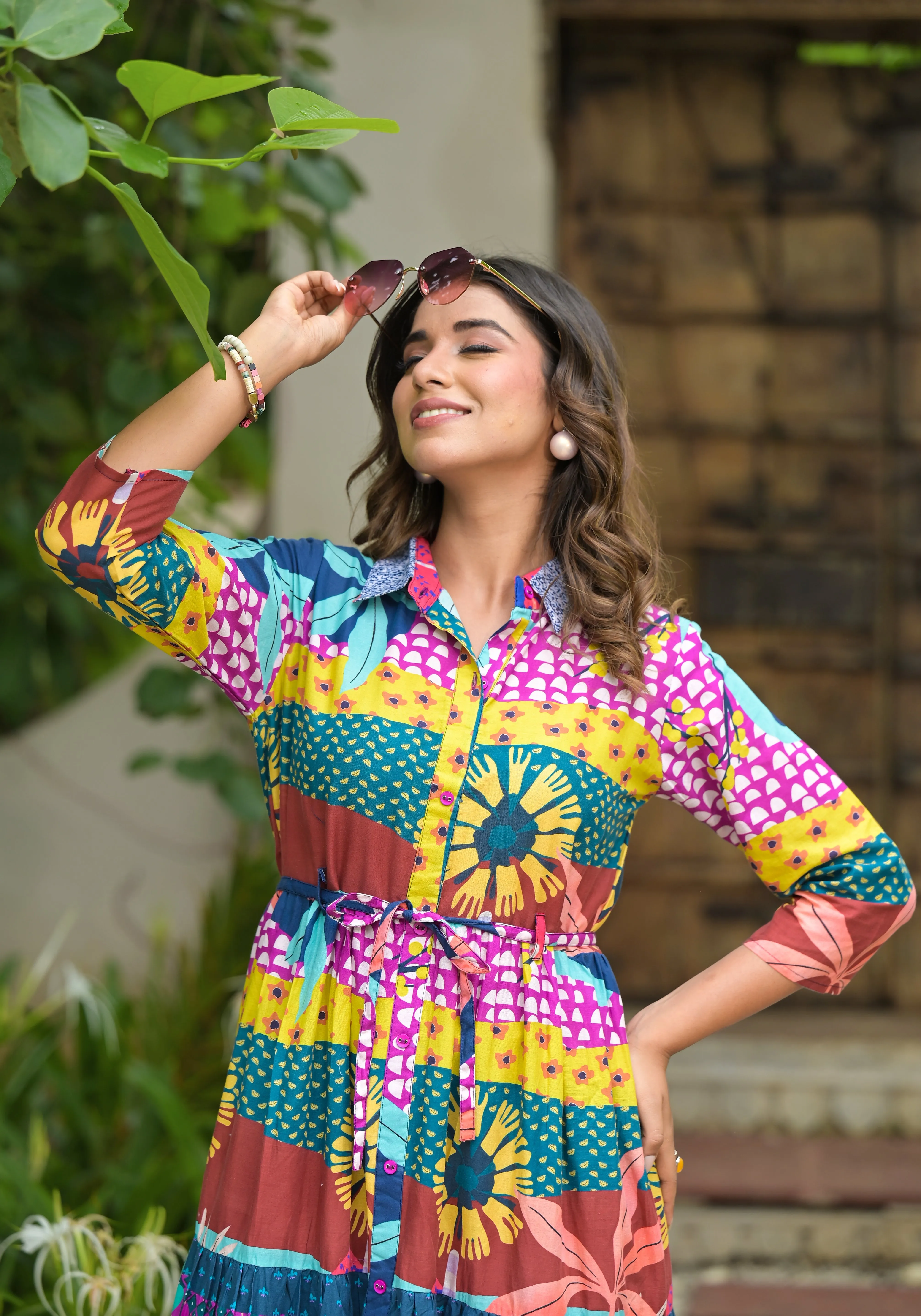 Jashvi Multi Geometric Printed Cambric Dress With Buttons & Doris On Waist