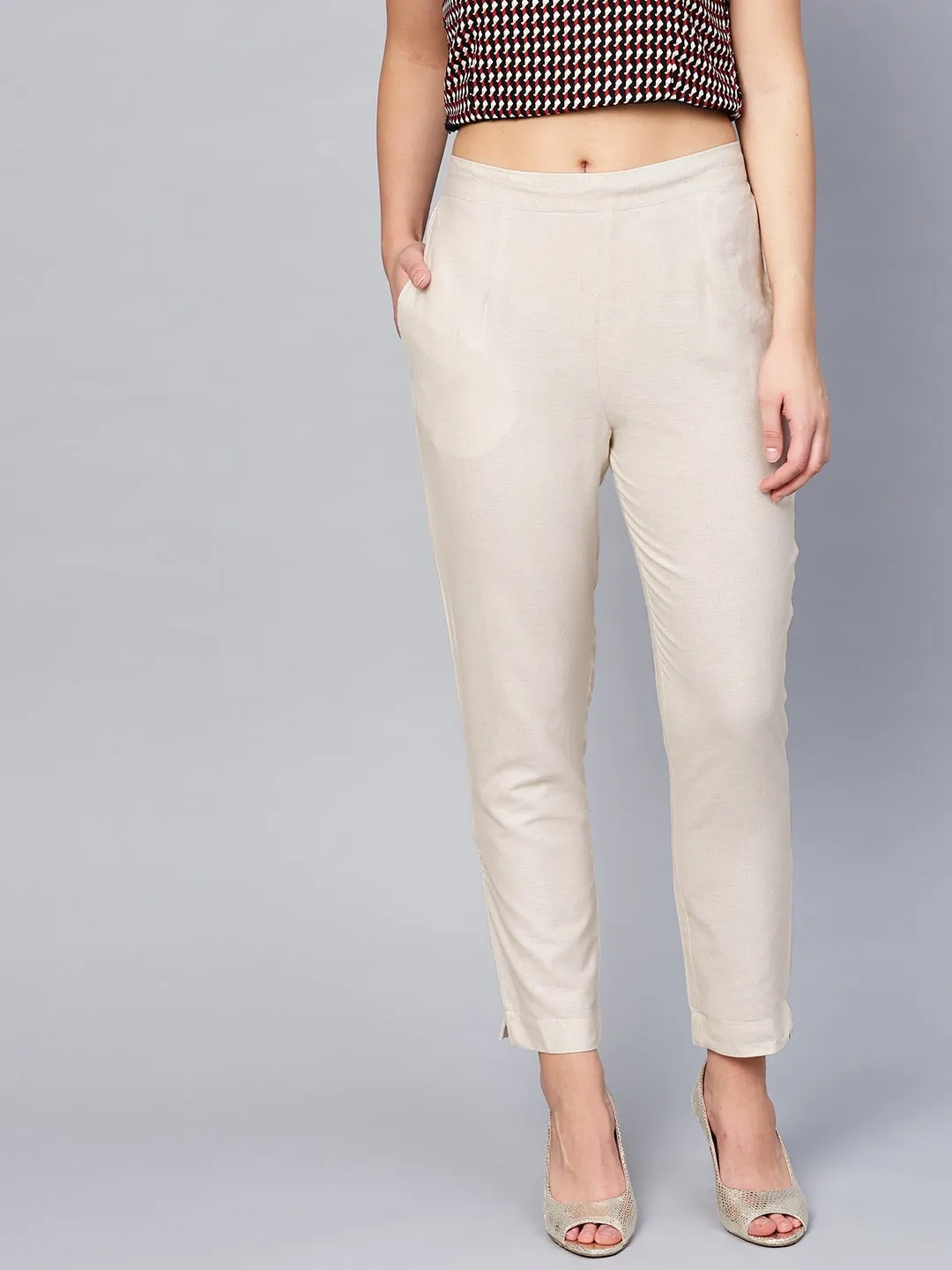 Jashvi Off-White Solid Cotton Flex Slim Fit Women Pants With Two Pockets