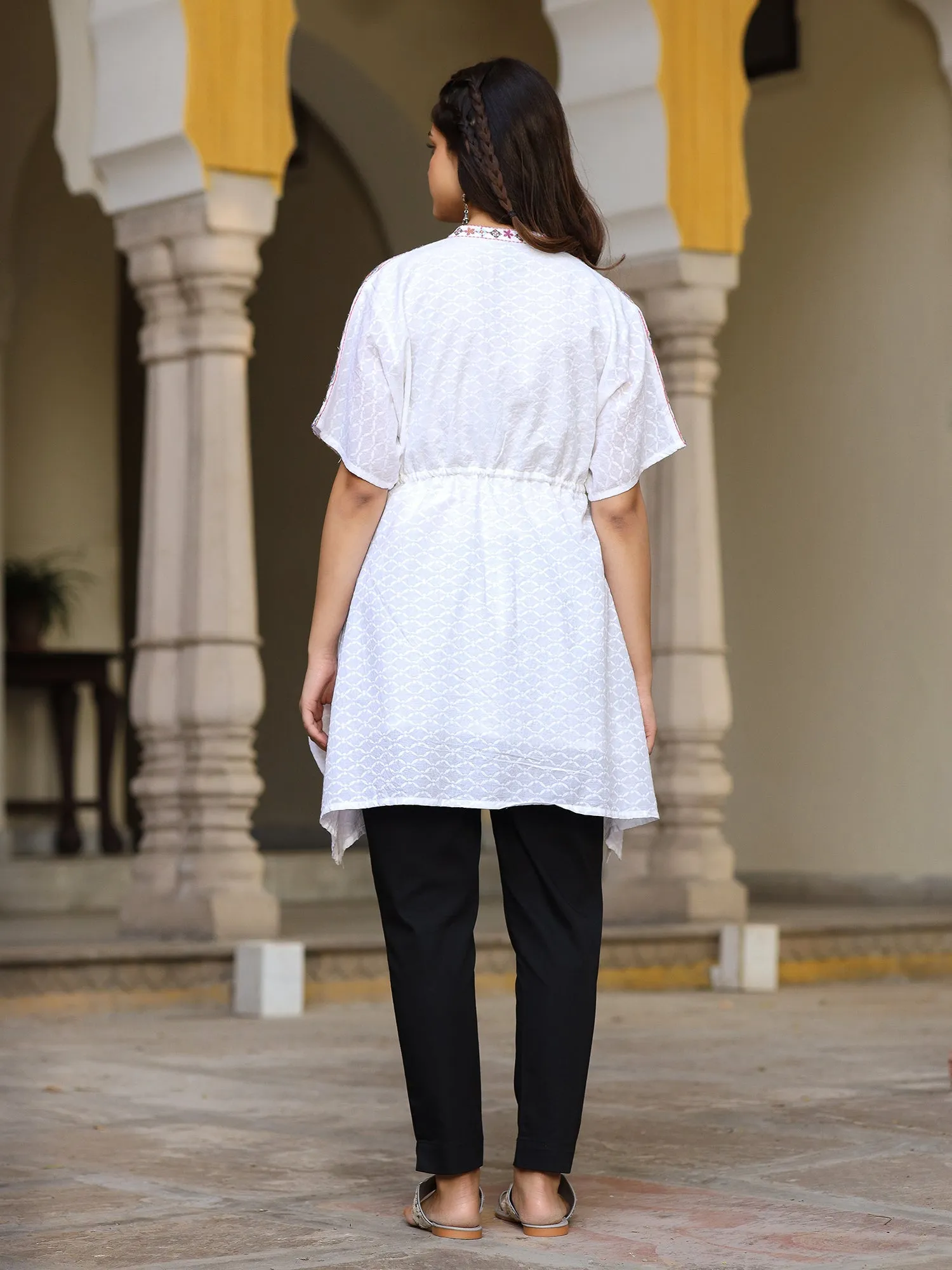 Jashvi White Cotton Dobby Asymmetric Peplum Tunic With Multi Colored Thread Embroidery