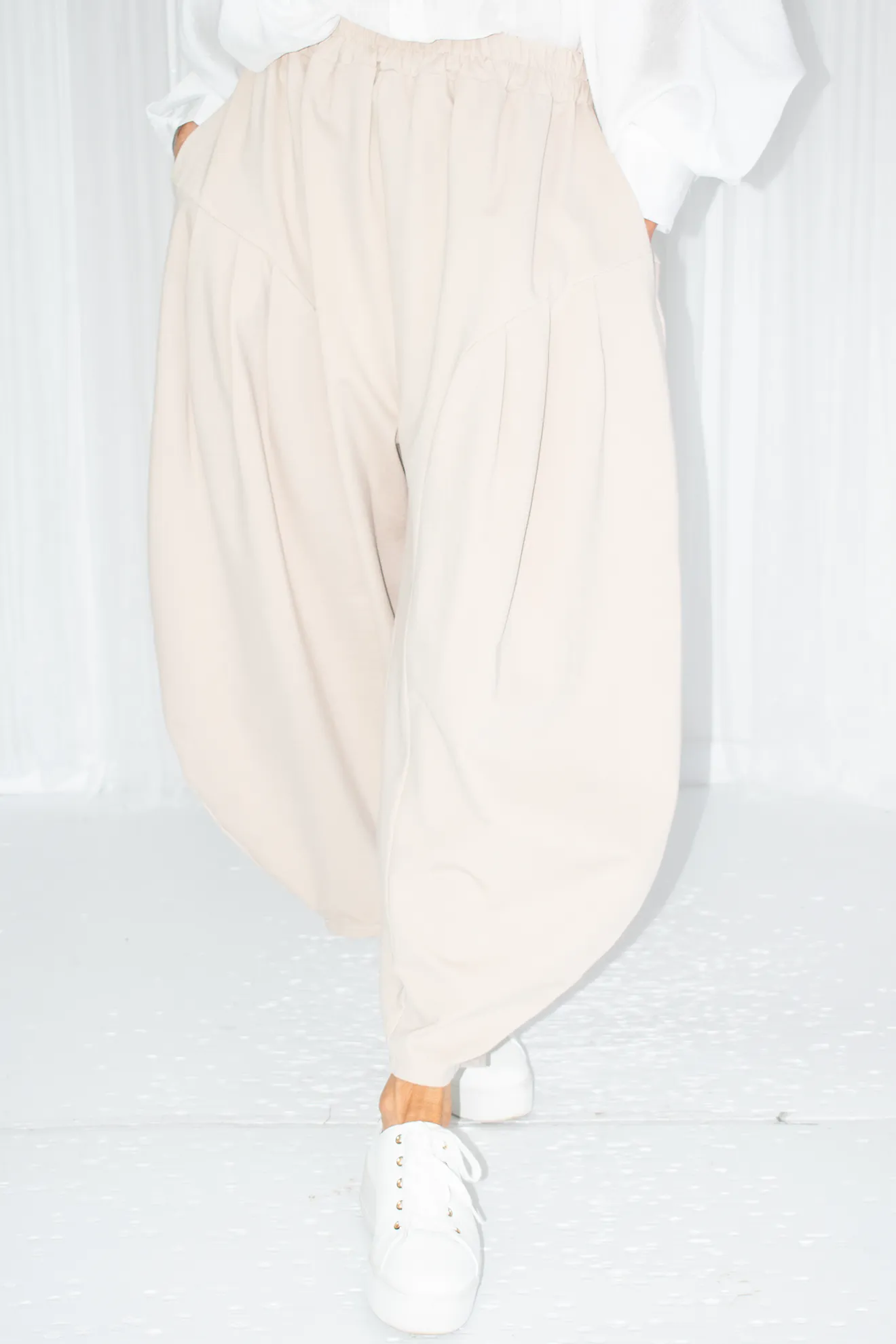 Juniper Pleat Waist Cocoon Trouser in Warm Beige