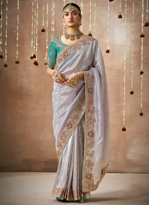 Lavender And Teal Multi Embroidery Tissue Silk Saree