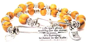 Life Isn't About Waiting For The Storm To Pass Its About Learning To Dance In The Rain Natural Wood Double Bangle Set