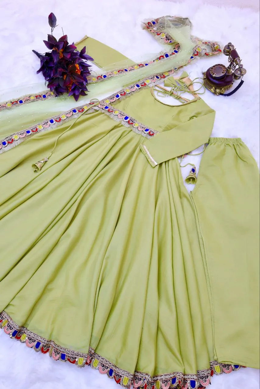 Light Green Luxurious Chinon Silk Embroidered Gown with Flowing 8 Meter Flair