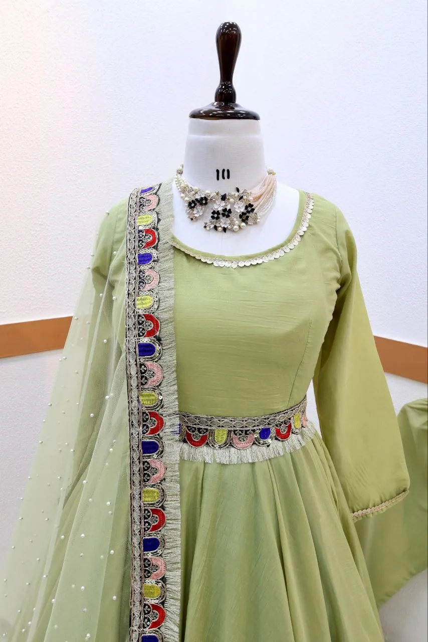 Light Green Luxurious Chinon Silk Embroidered Gown with Flowing 8 Meter Flair