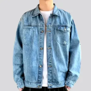 Light-wash distressed jeans jacket