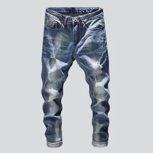 Light wash men's ripped jeans