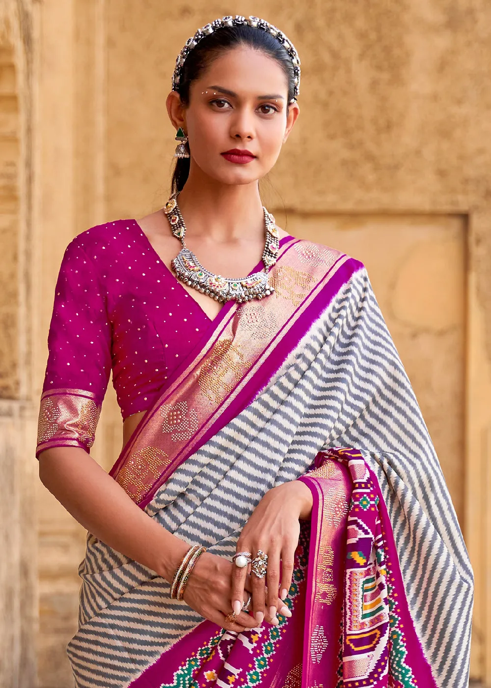 Magenta Purple Designer Patola Silk Saree with Zari Border & Stone work