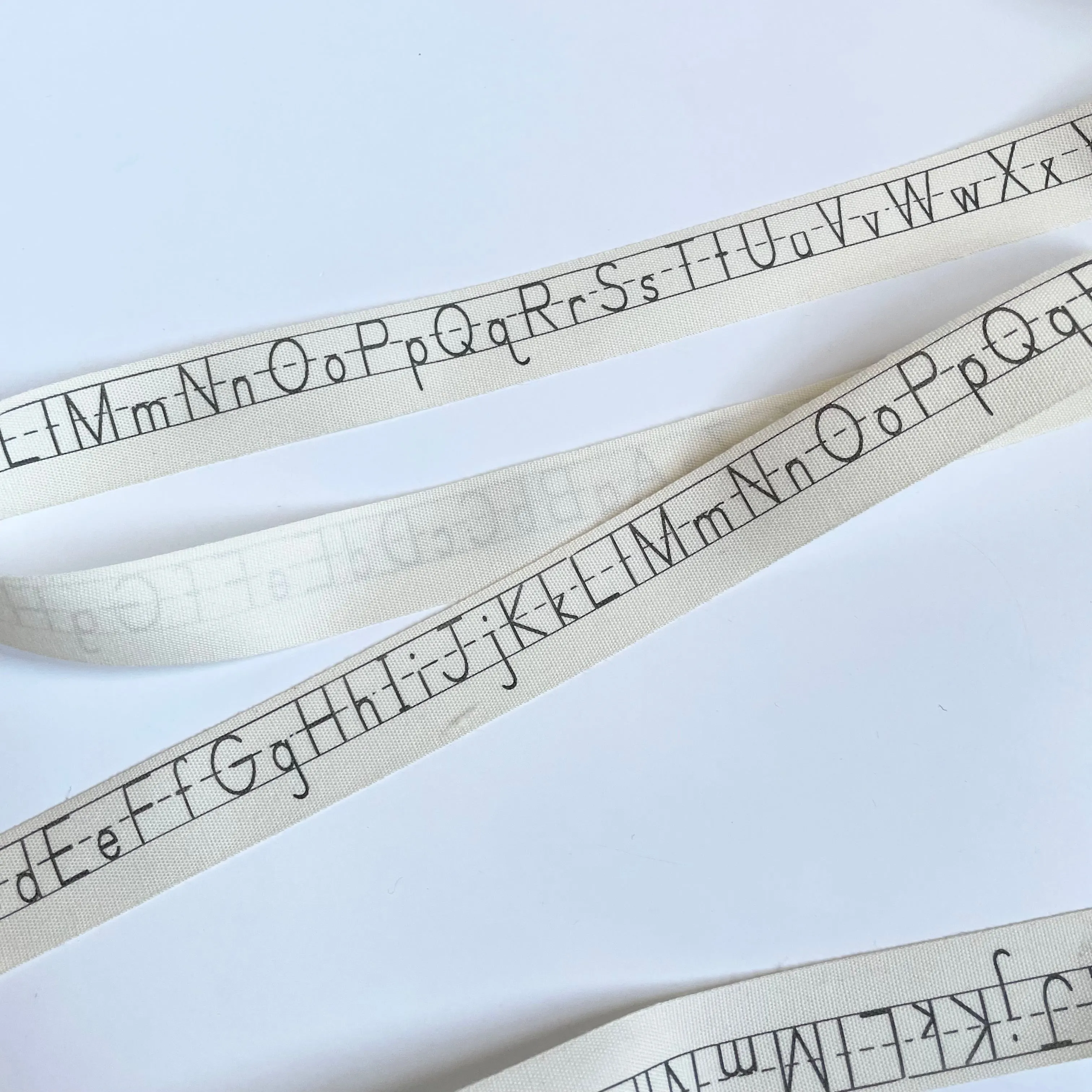 May Arts Ribbon Ivory Cotton Ribbon - Alphabet Print