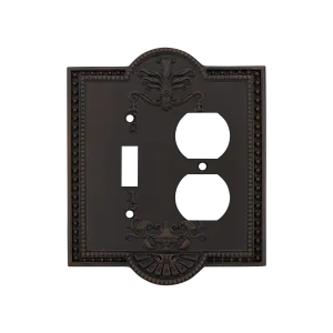 Meadows Switch Plate with Toggle and Outlet in Timeless Bronze