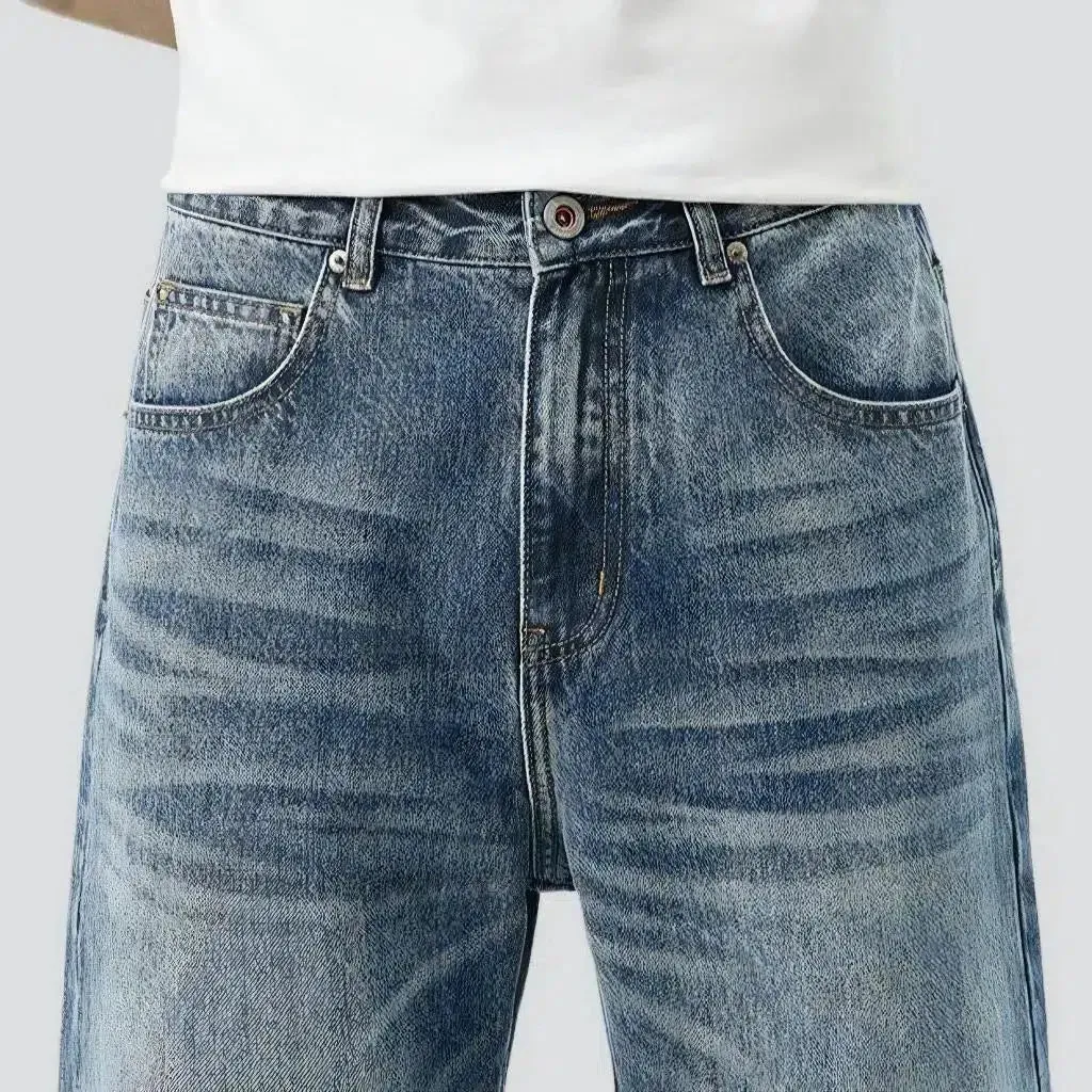 Medium-wash men's fashion jeans