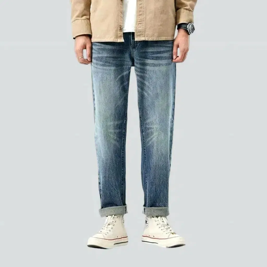 Medium-wash men's fashion jeans