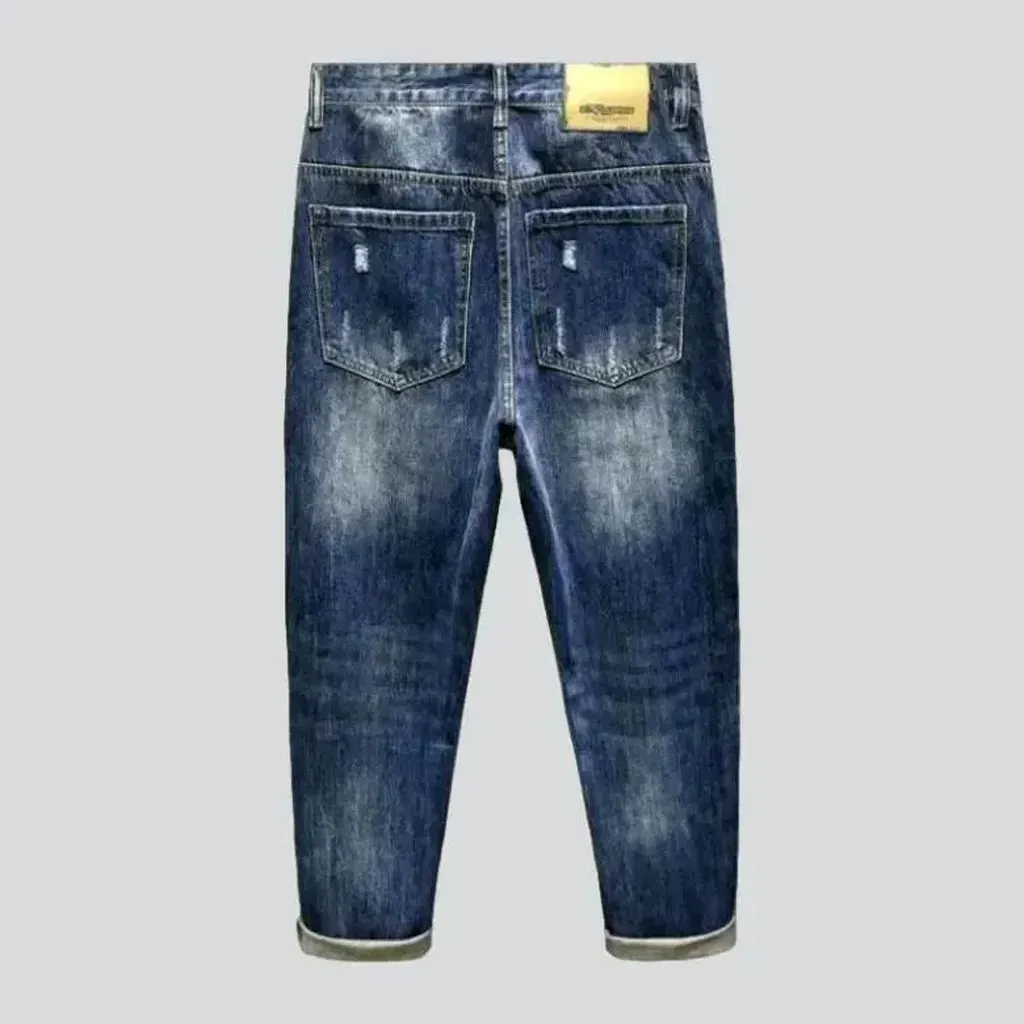 Medium-wash men's loose jeans