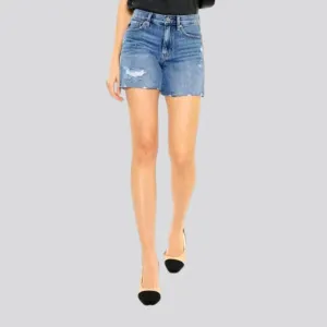 Medium-wash whiskered jeans shorts for women