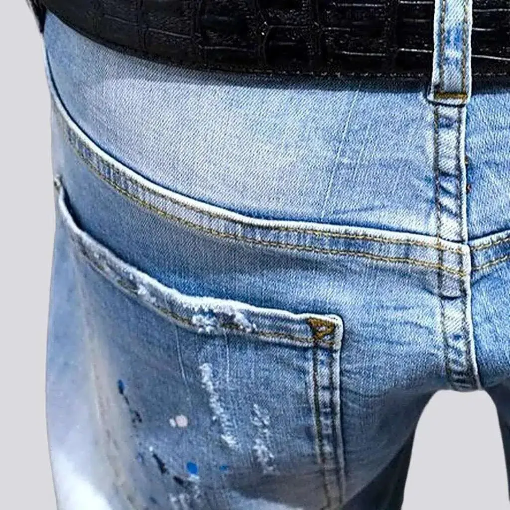 Men's paint-splattered jeans