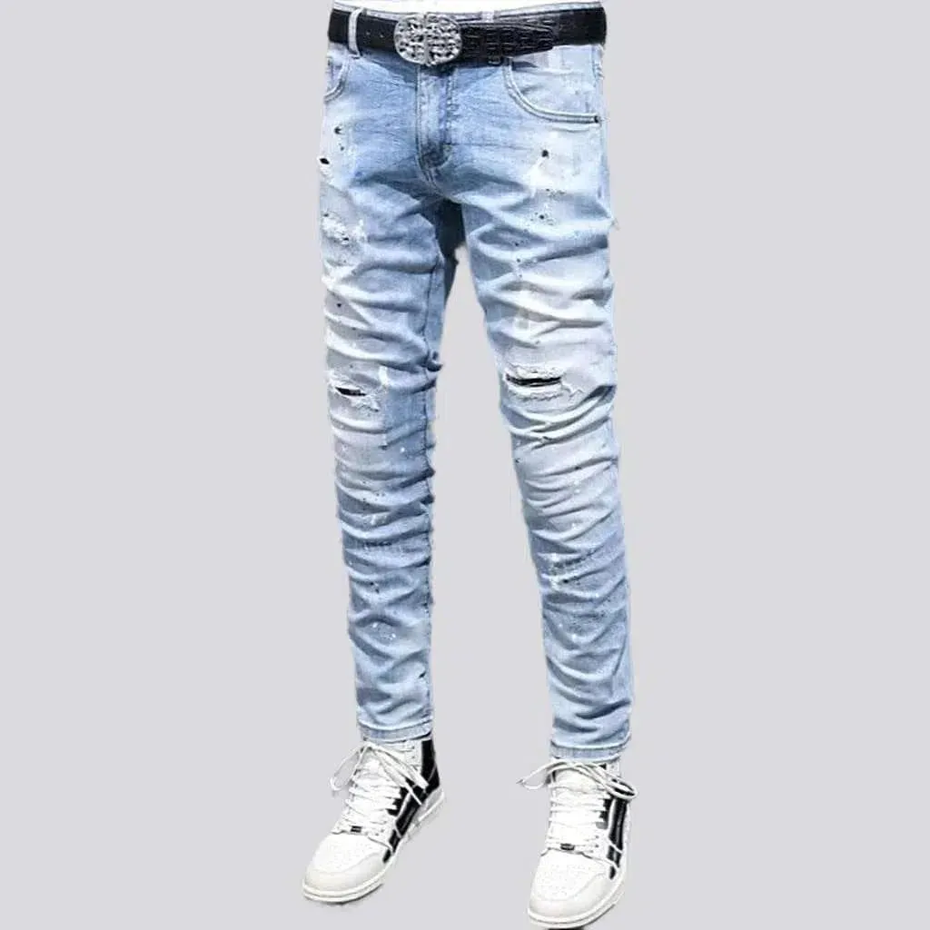 Men's paint-splattered jeans