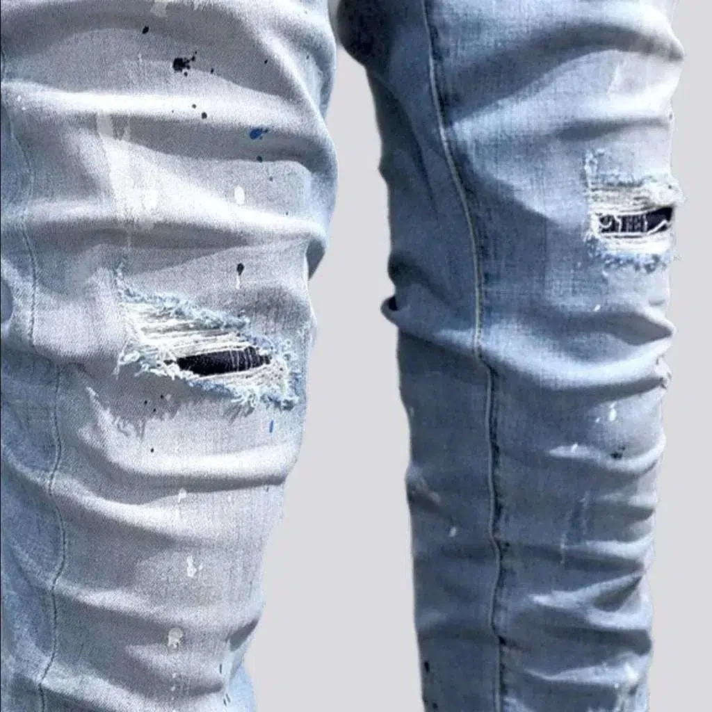 Men's paint-splattered jeans