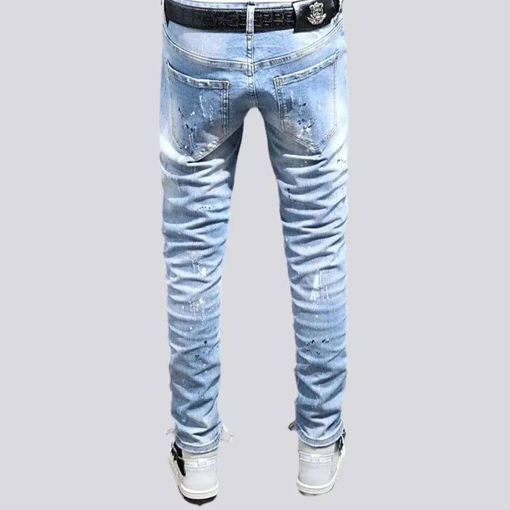 Men's paint-splattered jeans