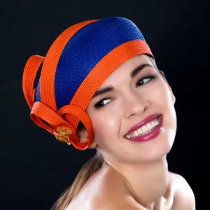 NA0047- Royal blue dress hat with orange trim design and applique