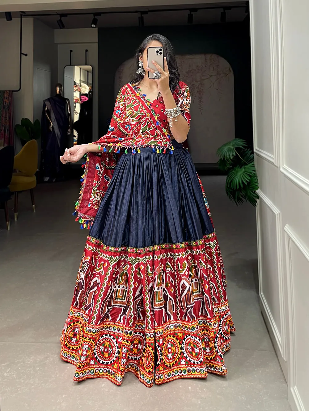 Navy Blue Color Patola Print With Gamthi Work And Mirror Work Dola Silk Chaniya Choli