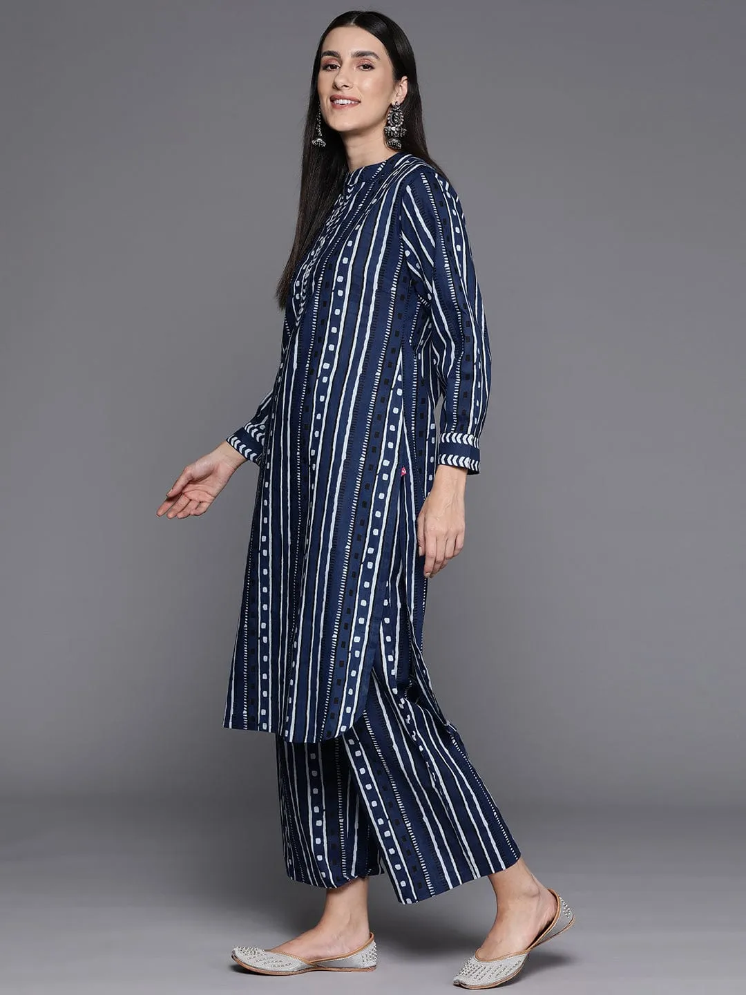 Navy Blue Printed Mandarin Collar With Placket Straight Kurta With Side Slits Paired With Tonal Printed Bottom.