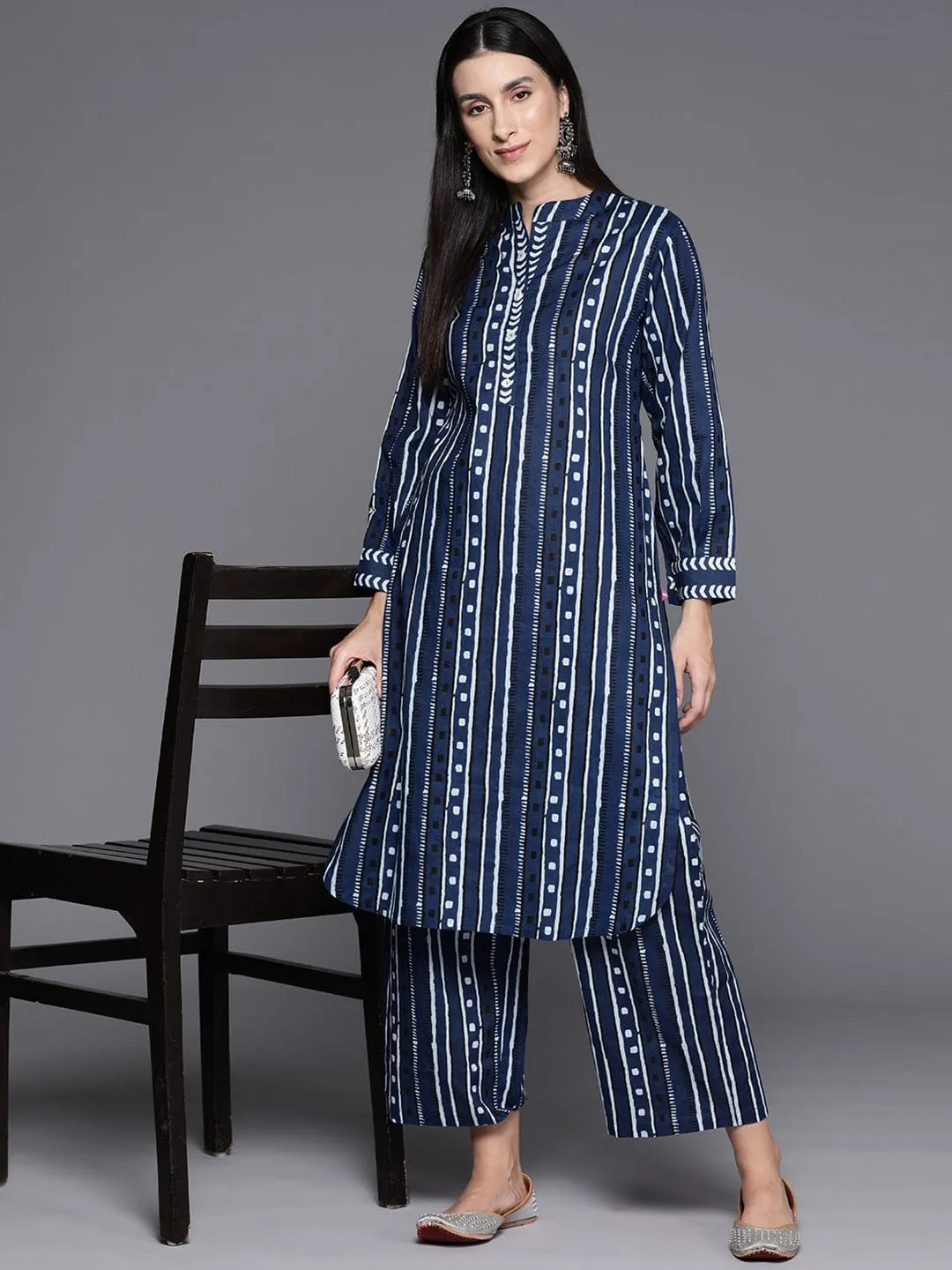 Navy Blue Printed Mandarin Collar With Placket Straight Kurta With Side Slits Paired With Tonal Printed Bottom.