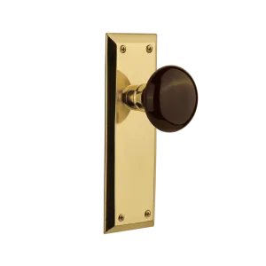 New York Long Plate with Brown Porcelain Knob in Unlacquered Brass