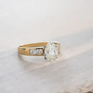 Oval Cut Diamond Engagement Ring in 18K Yellow and White Gold